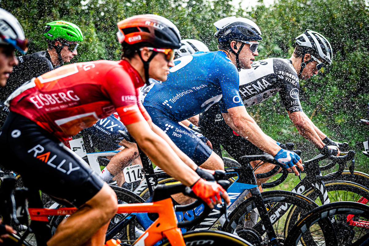 A group of cyclists cycling from left to right with hedges behind them. Picture by Alex Whitehead/SWpix.com - Cycling - 09/09/2021 - AJ Bell Tour of Britain - Stage 5: Alderley Park to Warrington - Gabriel Cullaigh of Movistar.